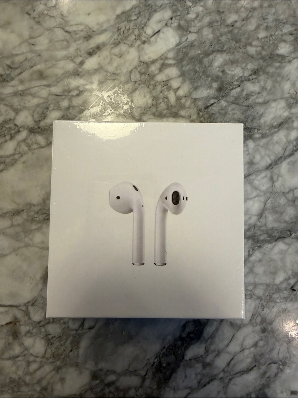 2nd generation apple AirPods in packaging brand new with case